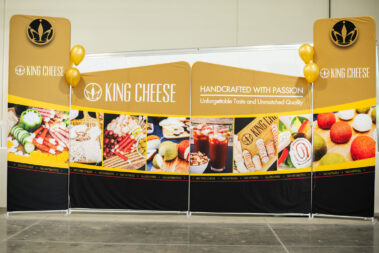King Cheese banners standing together.