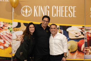 Vic and Kimmberly posing for a picture with a friend.