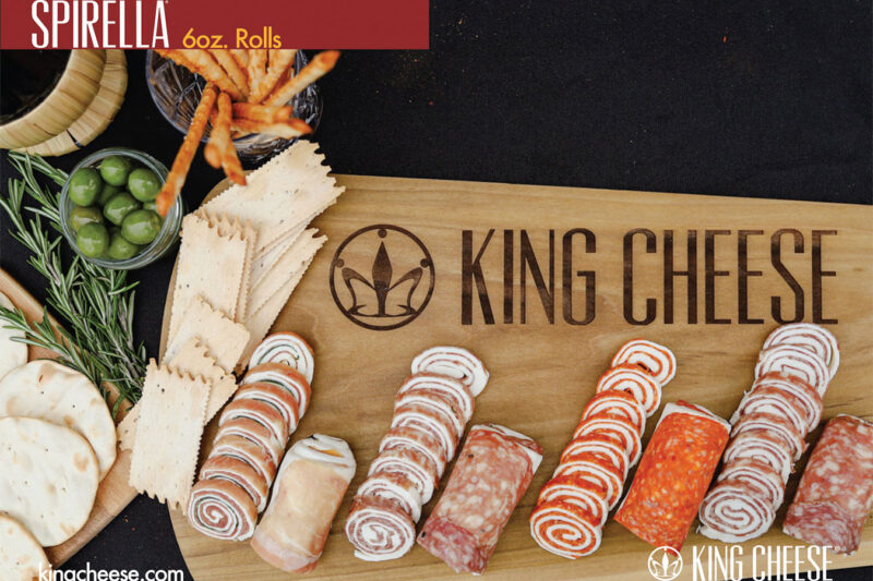 6oz Spirella rolls on a wooden cutting board with crackers.