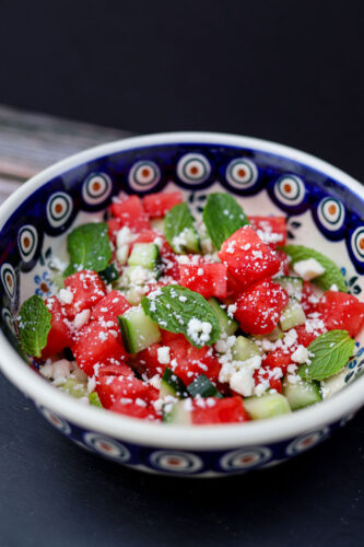 Watermelon Salad mix with feta cheese sprinkled on it.